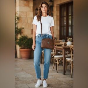 Western style Sam & Hadley brown faux leather medium crossbody bag.